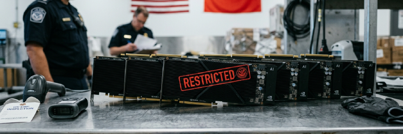 GPU chips on a customs table, one stamped 'RESTRICTED'